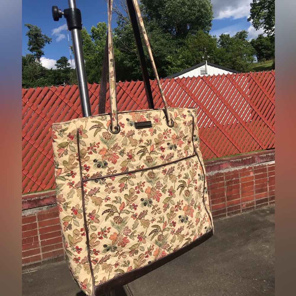 Longaberger purse/tote with Fall leaves pattern. Double handles. Inside pockets.